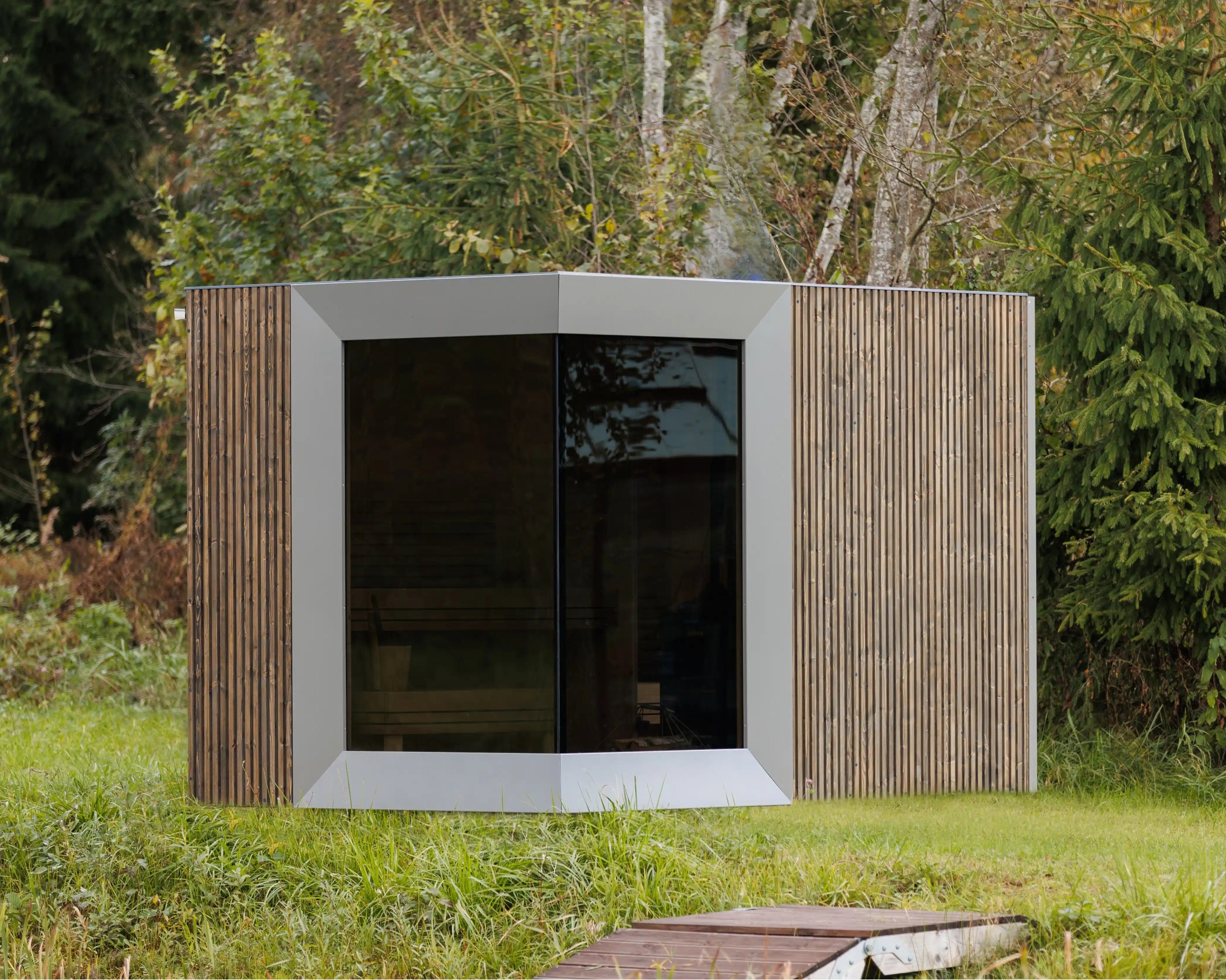 Modern wooden cabin in a forest setting