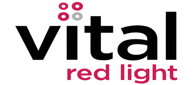 Logo of 'Vital red light' with black text and red accents on a white background