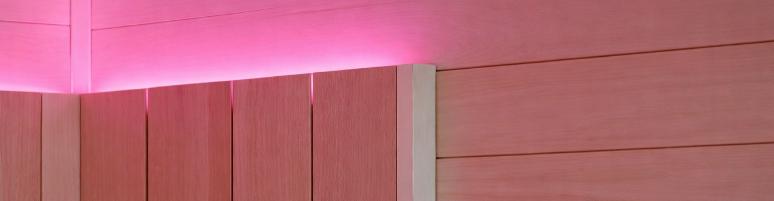 Wooden fence with pink LED strip lighting