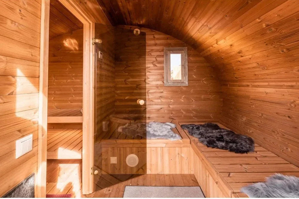 Wooden sauna interior with wooden walls and floor.