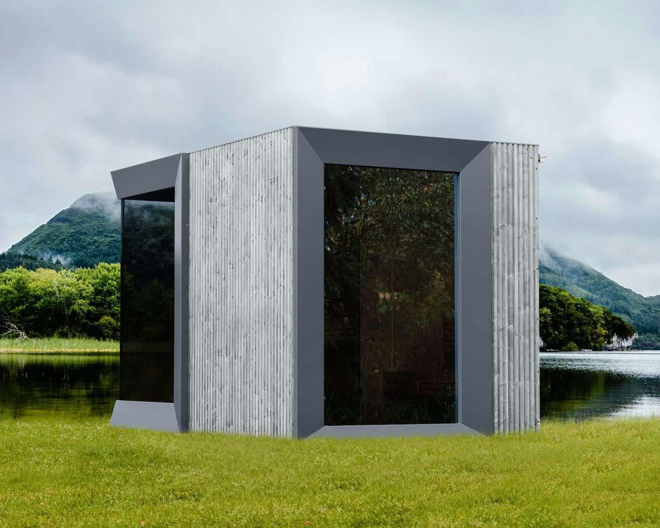Modern architectural structure with glass panels in a natural setting